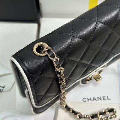 QUILTED FLAP BAG WITH WHITE TRIM 19 IN BLACK LAMBSKIN