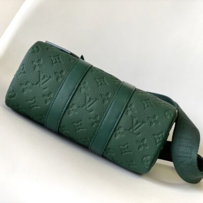 KEEPALL BANDOULIÈRE 25 IN FOREST GREEN MONOGRAM EMBOSSED CALFSKIN