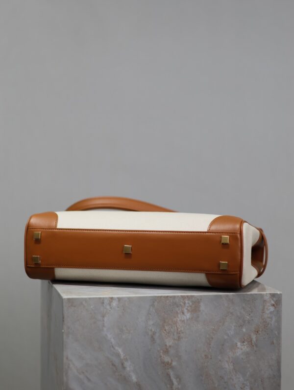 img_f8c0bdc9_20240525_i1716628930_4627_6_jpg MANHATTAN HANDBAG 32 IN BROWN CALFSKIN AND WHITE CANVAS GOLD HARDWARE