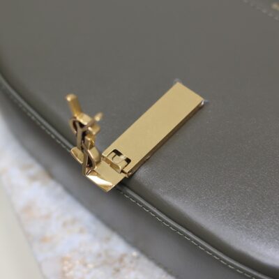 MINI VOLTAIRE IN BOX 17 IN KOMBU GREEN CALFSKIN GOLD LOGO