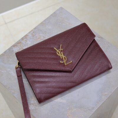 CASSANDRE CLUTCH 21 IN BORDEAUX RED LAMBSKIN GOLD HARDWARE