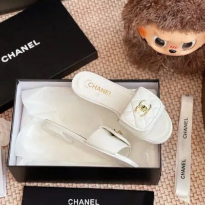 Chanel Quilted CC Turnlock Flat Mules in Lambskin