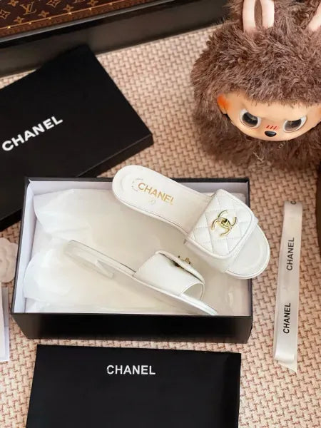 Chanel Quilted CC Turnlock Flat Mules in Lambskin